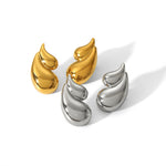 Rivage — boucles double goutte, finitions dorée et argentée ; une paire par commande.